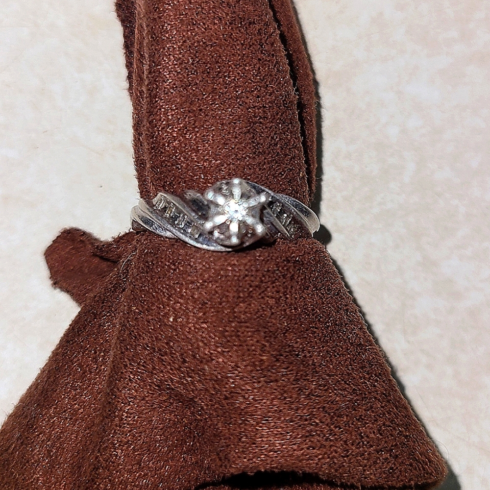 Sterling silver twist 1/4 CT diamond engagement ring